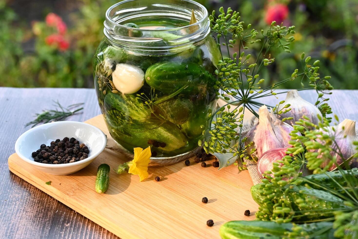 a set of ingredients for pickling cucumbers, pickled cucumbers, brine. photo