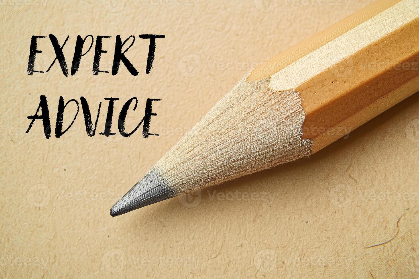 Expert advice message written on paper with a pencil photo