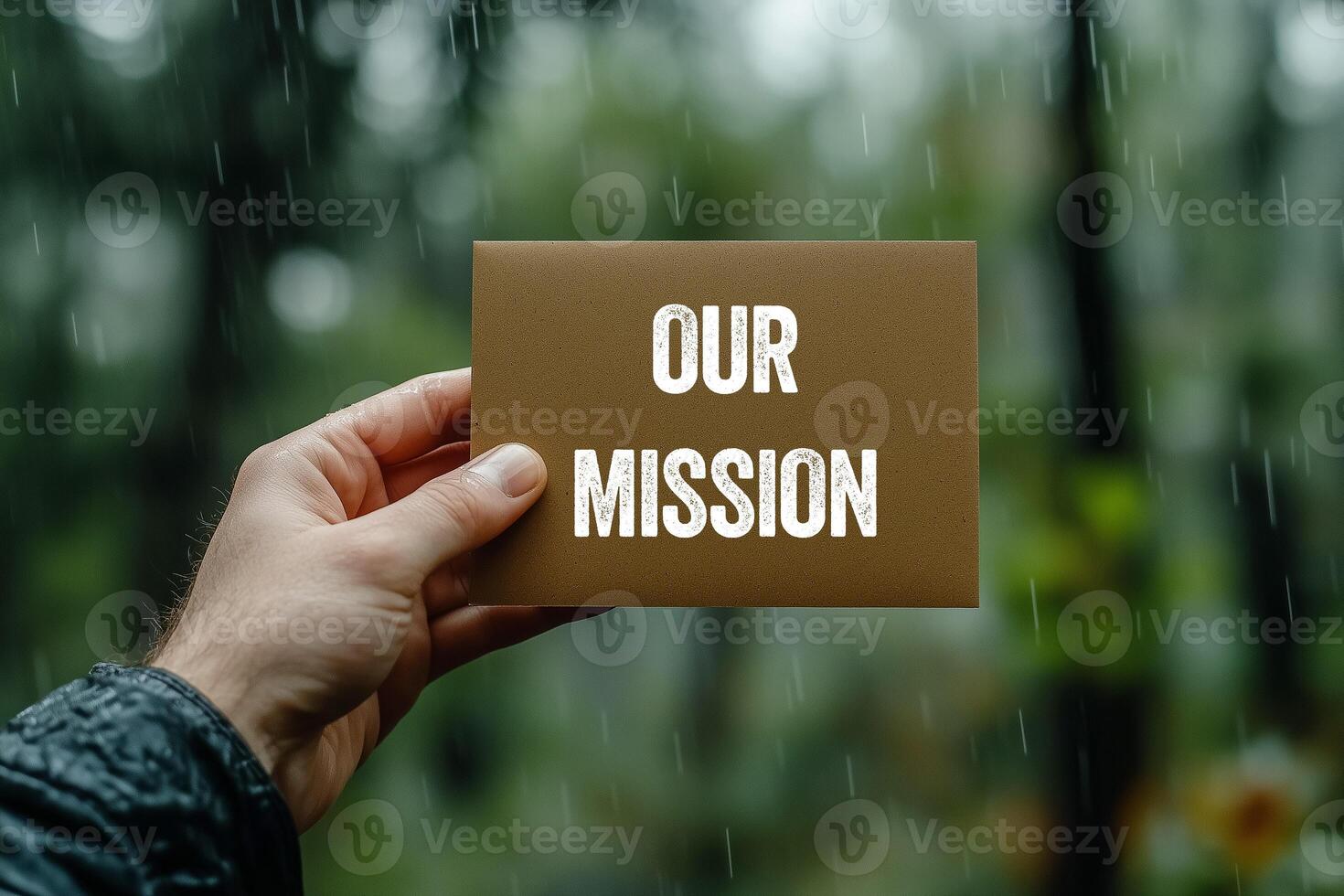Our mission message written on brown card photo