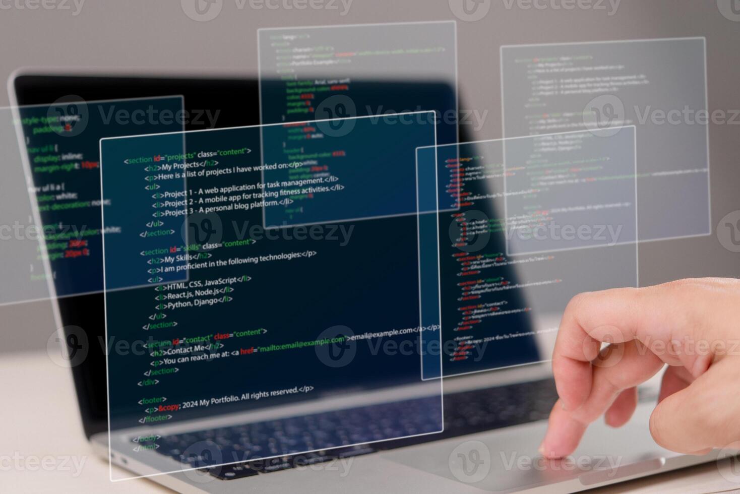 A person is using a laptop with code on it photo