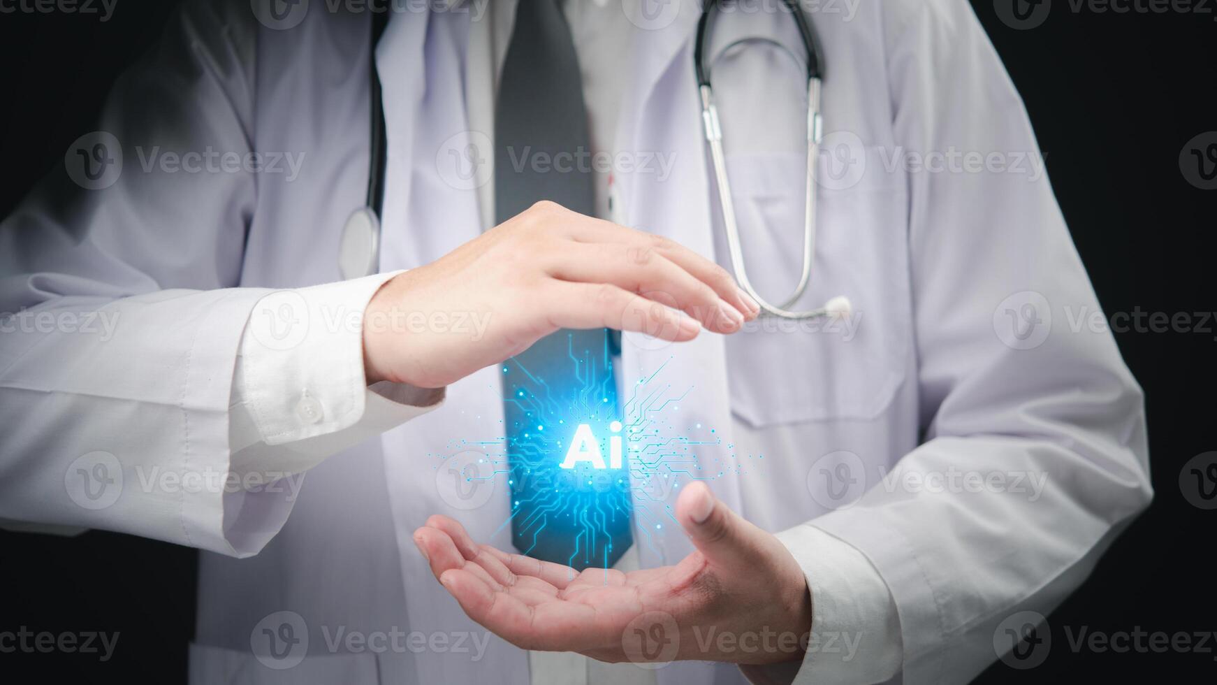 A doctor holding a glowing ai symbol in his hands photo