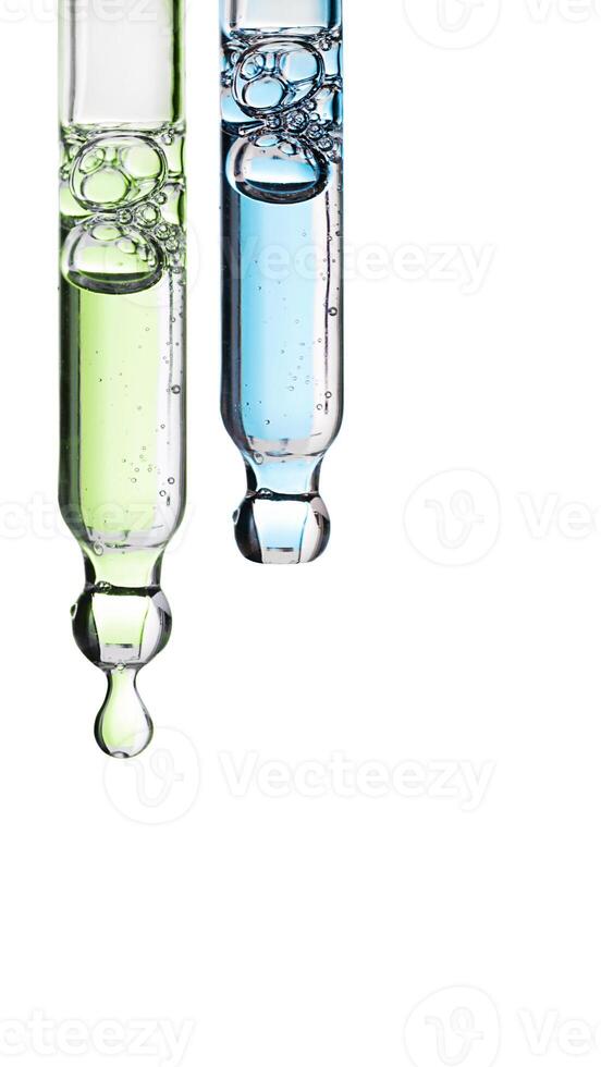Set pipette serum blue drop with clear liquid niacinamide, hyaluronic on a white isolated background photo