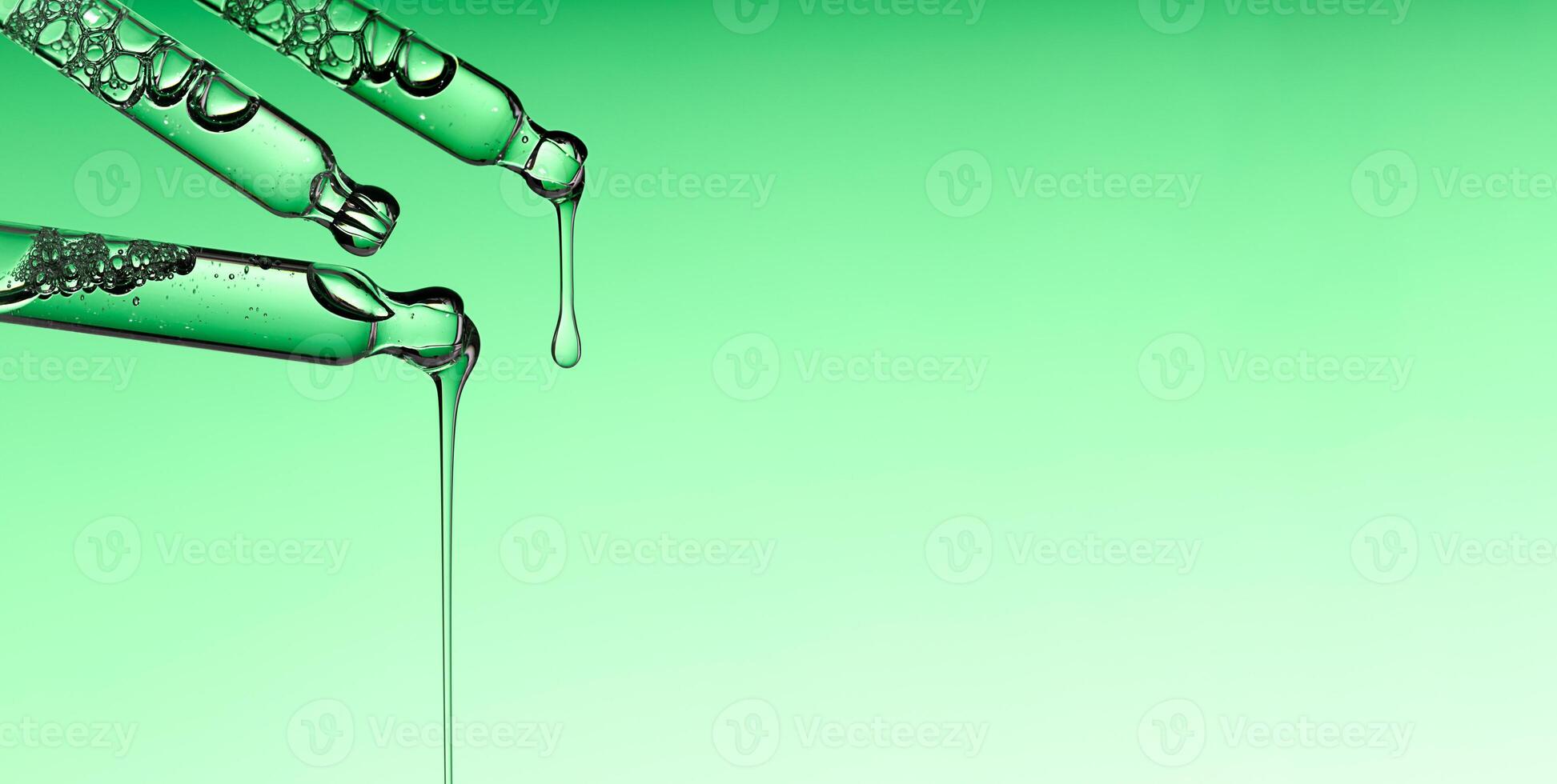 Pipette serum drop with niacinamide, hyaluronic or Aha Bha acids on a green isolated background photo
