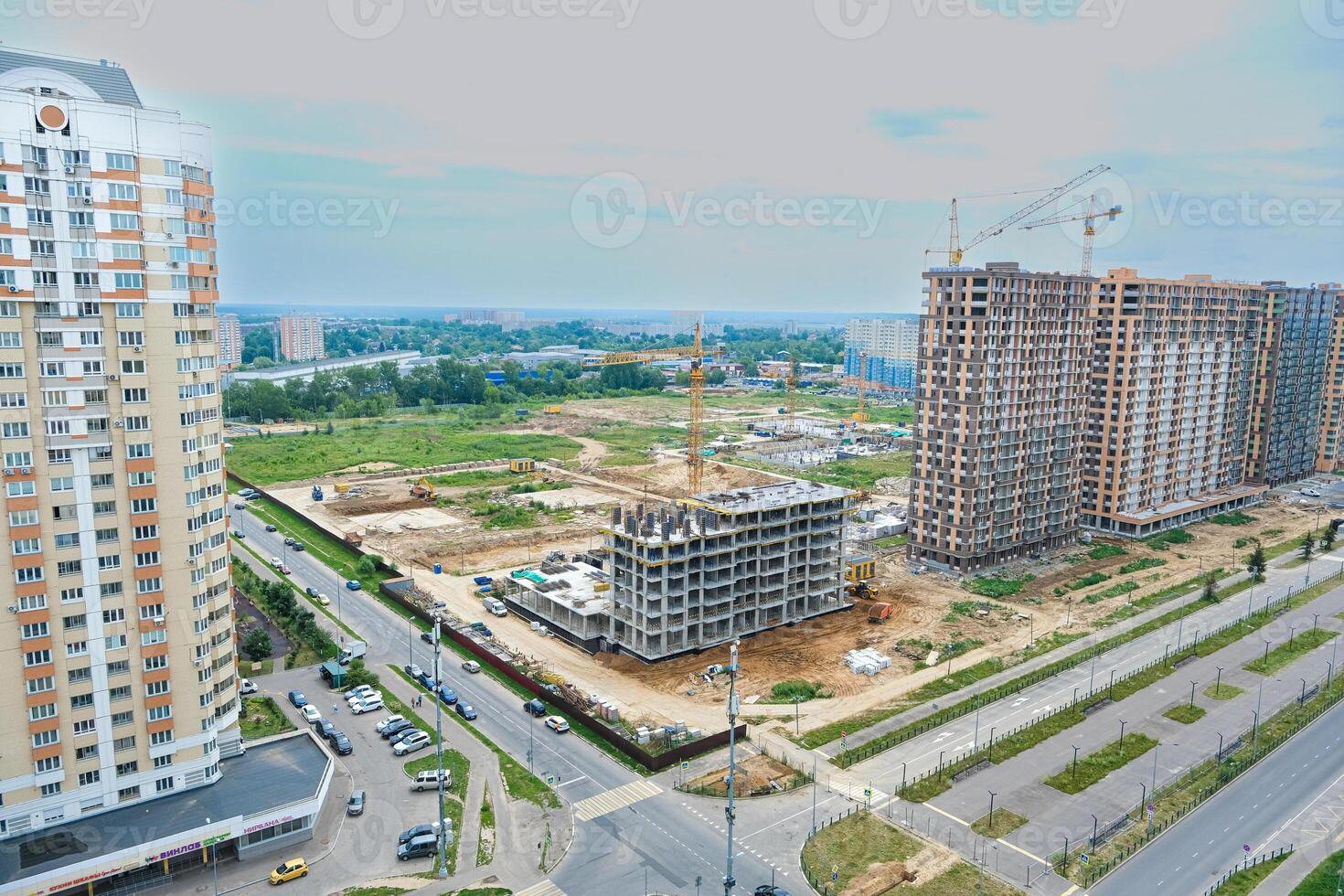Construction of modern high-rise residential buildings. photo