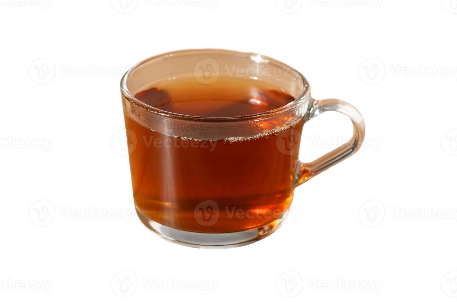 Warm cup of tea steaming gently on a table during a cozy afternoon session with friends photo