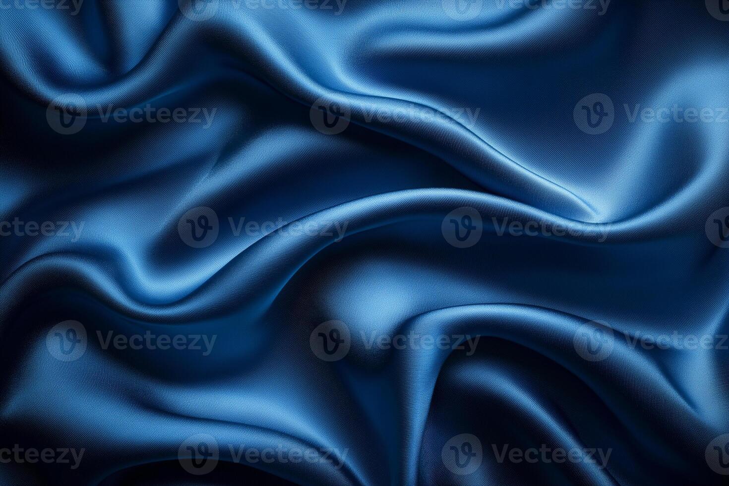Rich blue silk fabric draped gracefully conveying elegance and luxury in soft textures. photo