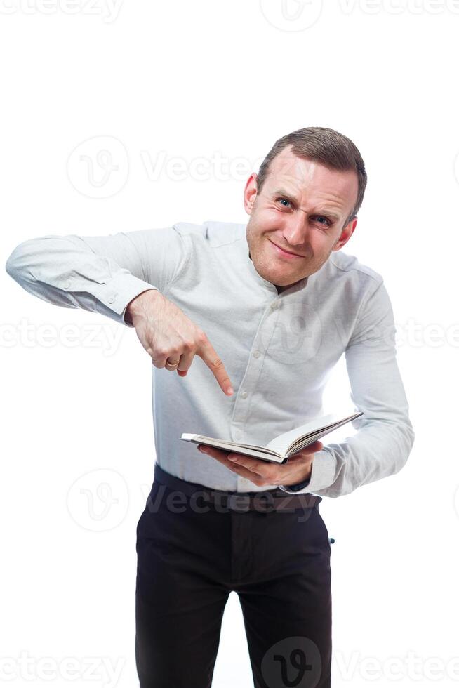 man businessman, teacher, mentor examines entries in your diary. Isolated on white background photo
