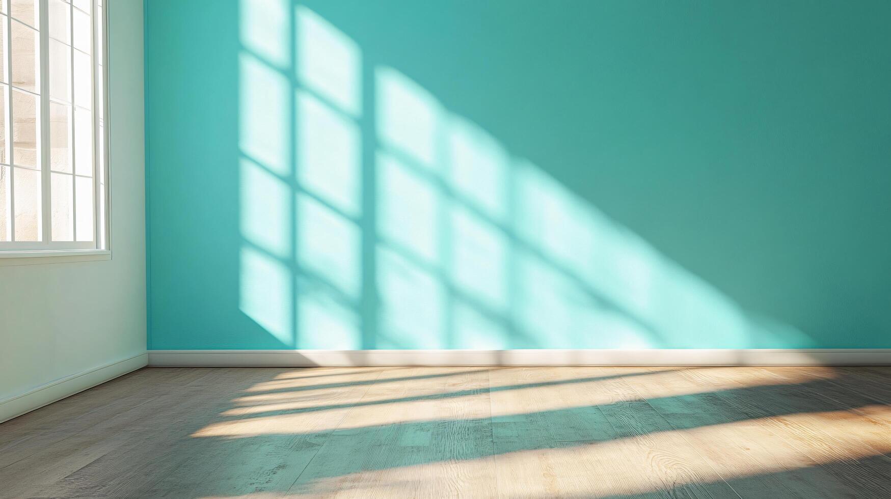 Large, empty room with a blue wall and a window. The room is very bright and airy, with a lot of natural light coming in through the window photo