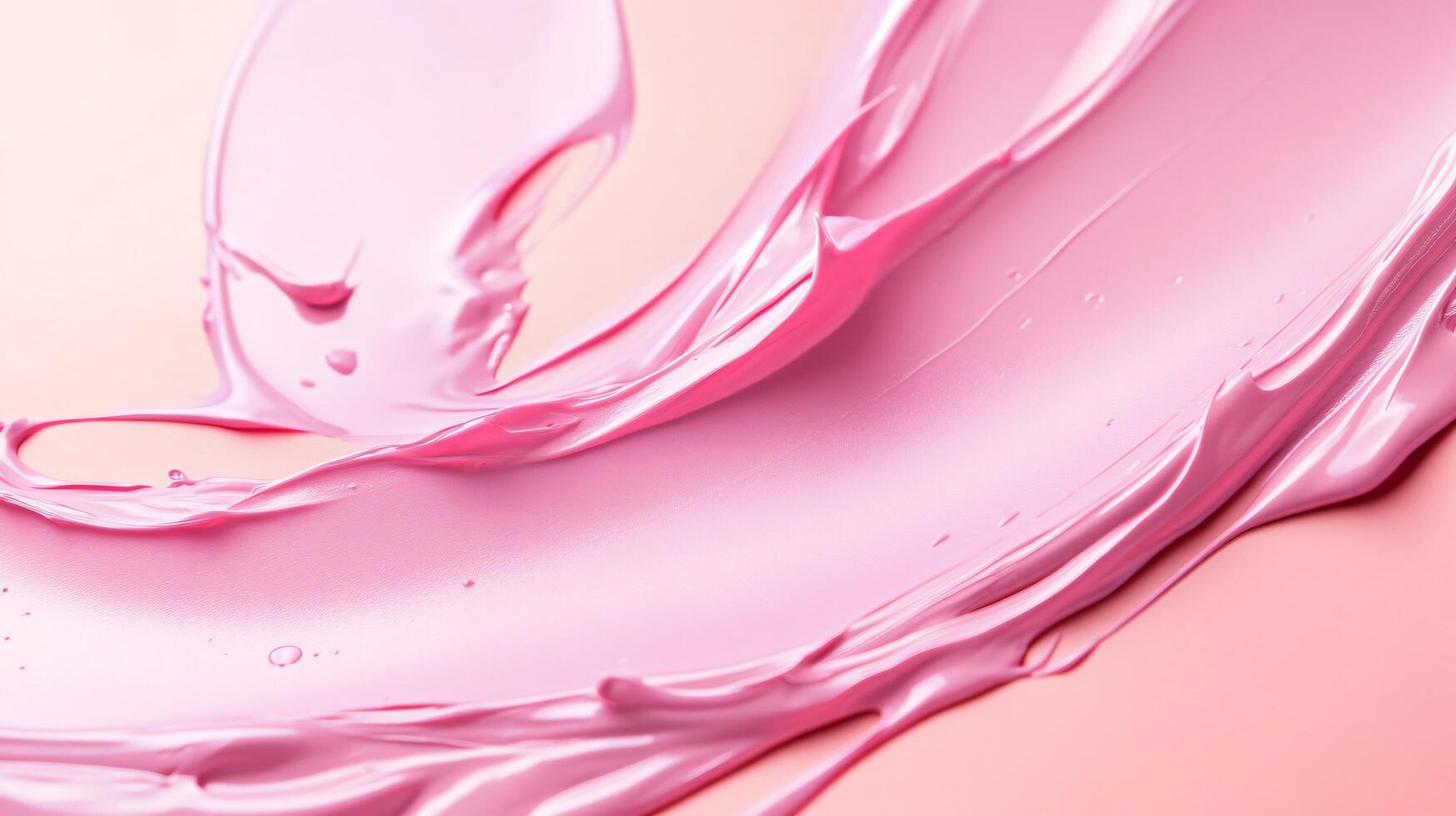 Pink brush stroke on a pink background. The brush stroke is long and curvy. The brush stroke is the main focus of the image photo