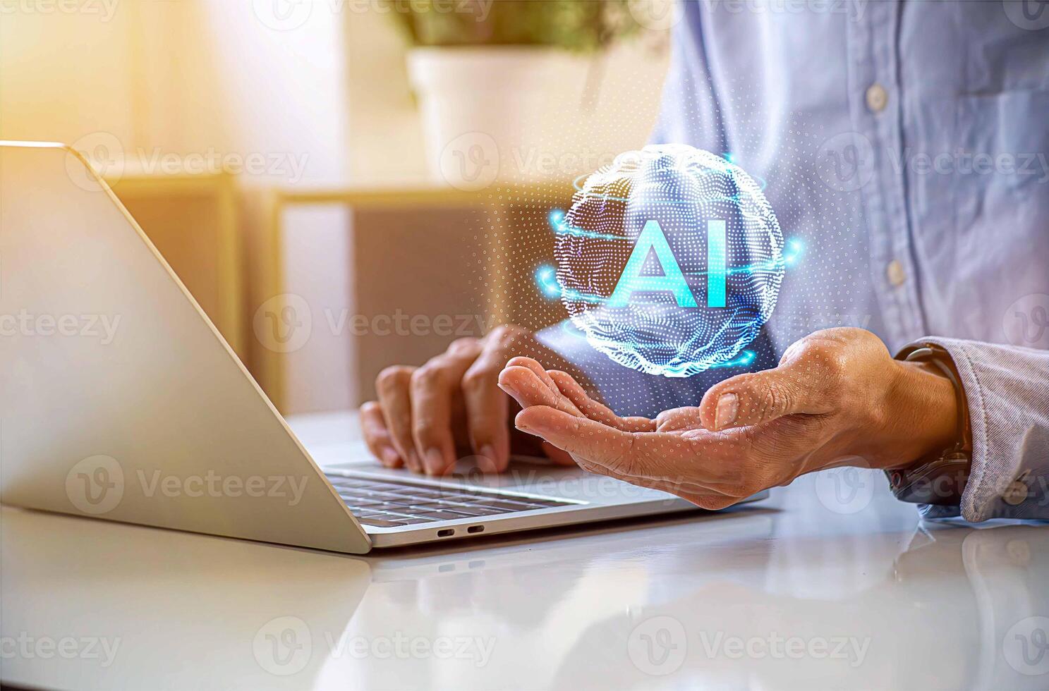 a man using a laptop with a virtual ai logo photo