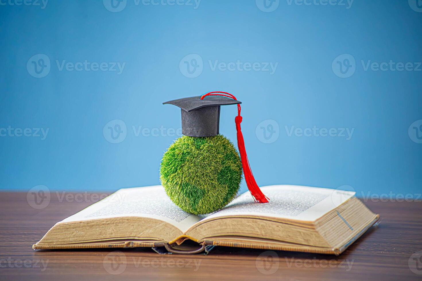 Education in Global, Graduation cap on Businessman holding Earth globe model map with Radar background on book. Concept of global business, abroad educational, Back to School. photo