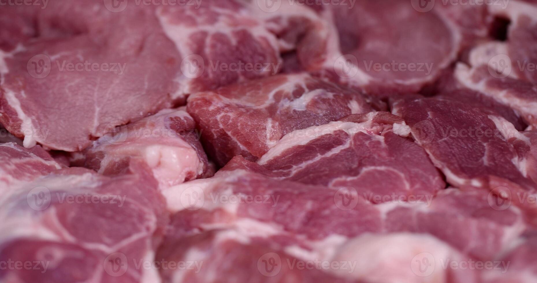 a sliced piece of pork meat from the neck photo
