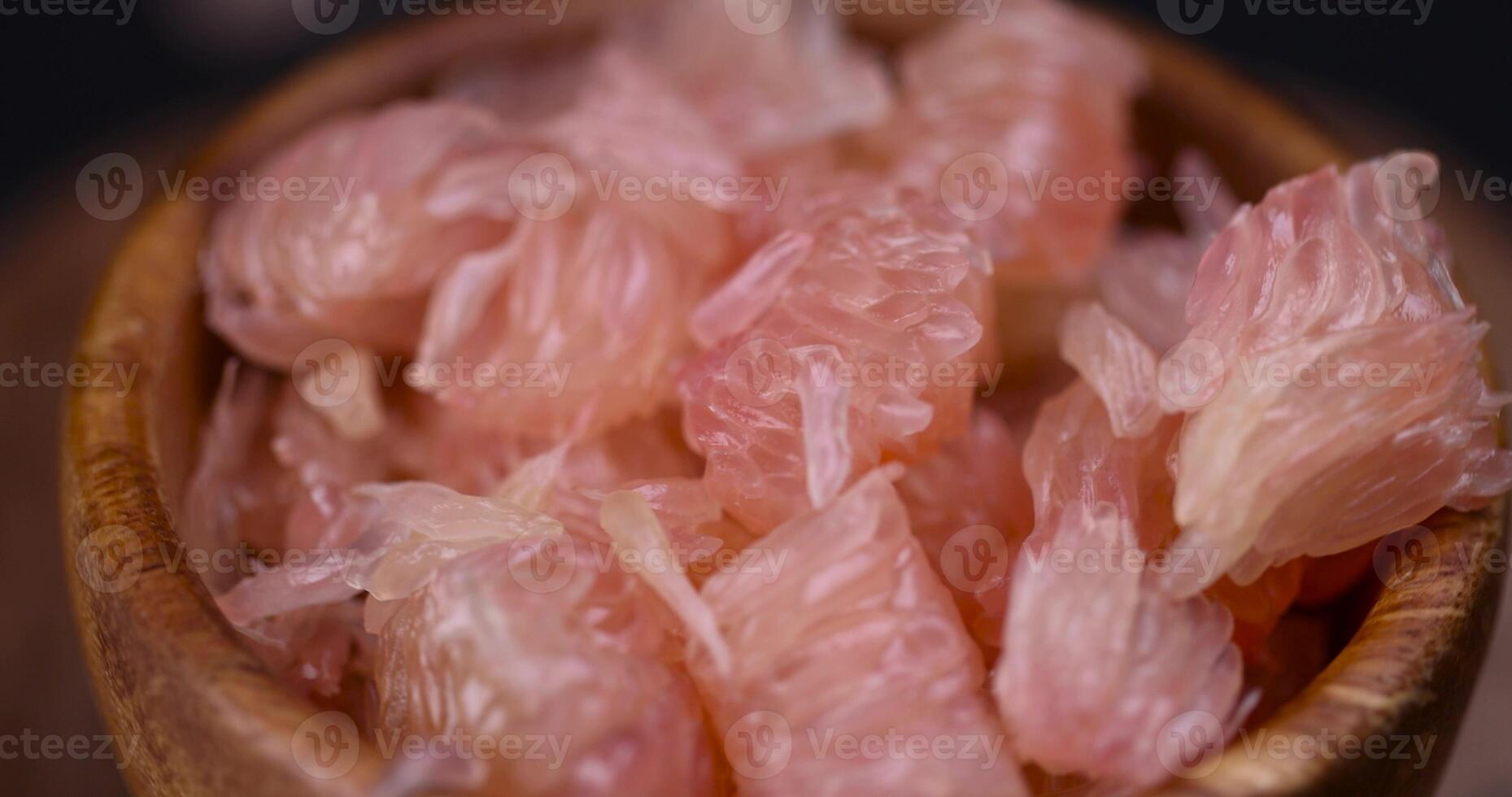 peeled citrus grapefruit without peel on the table photo