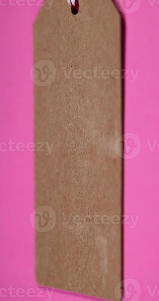 a paper label on a clothes rope photo