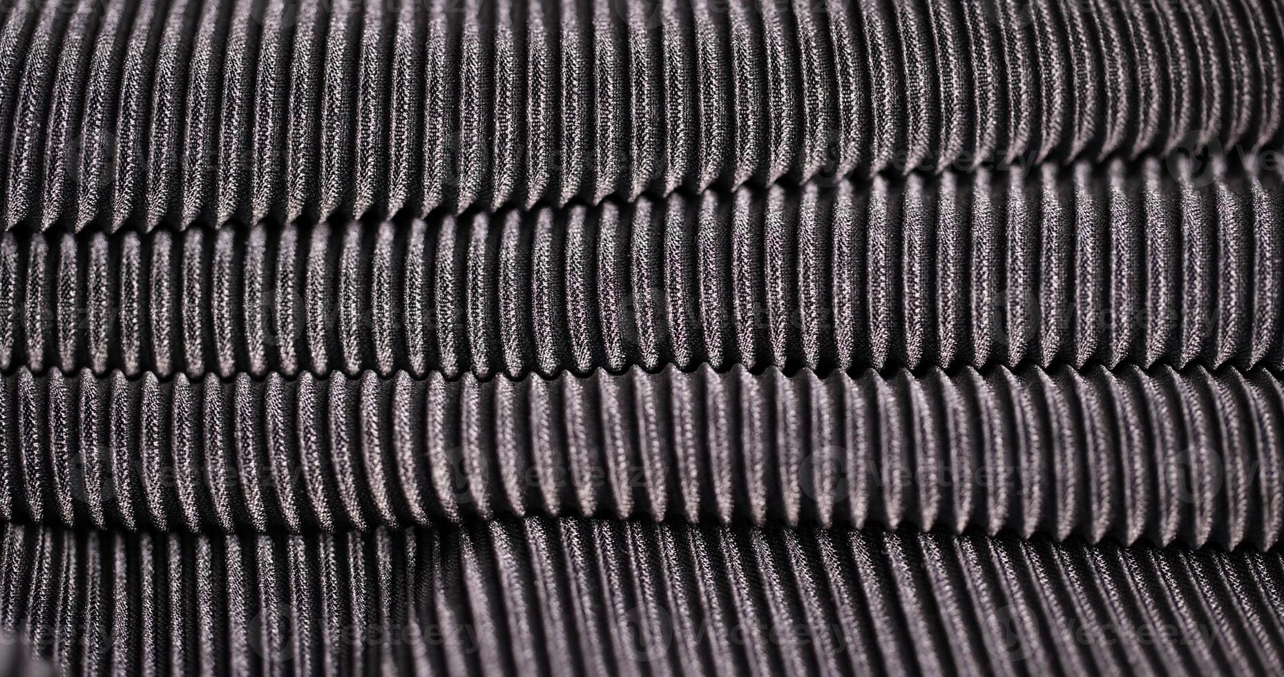 black fabric made of soft synthetic material close-up photo