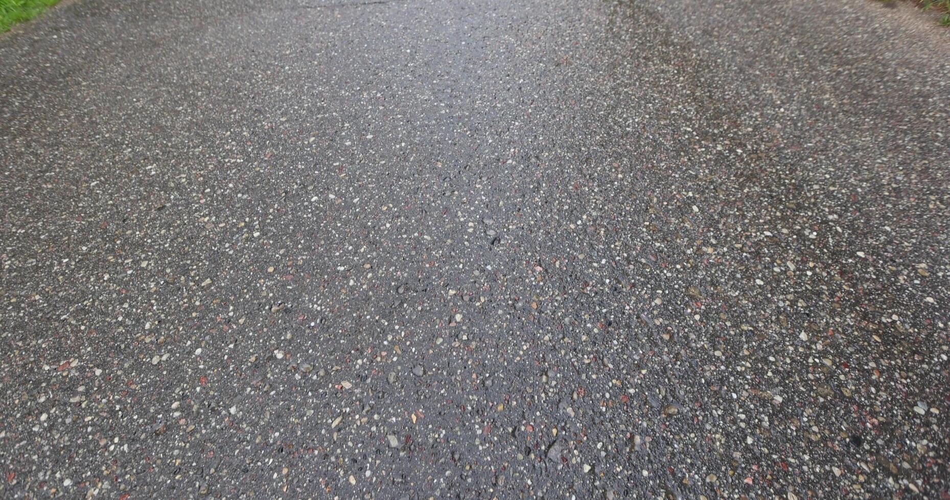 Wet rain field paved road photo