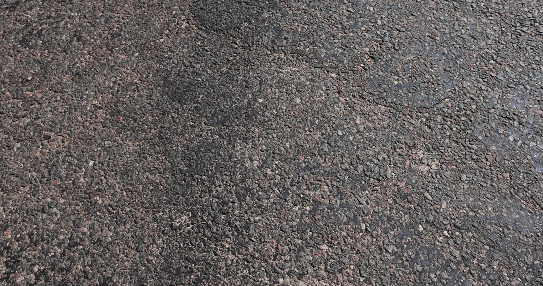 a part of a highway covered with asphalt photo