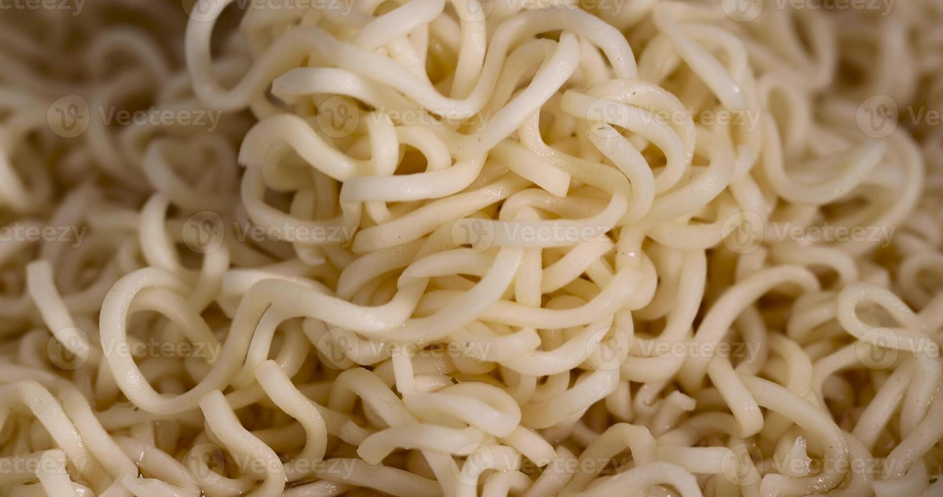 details of flour noodles with eggs during cooking photo