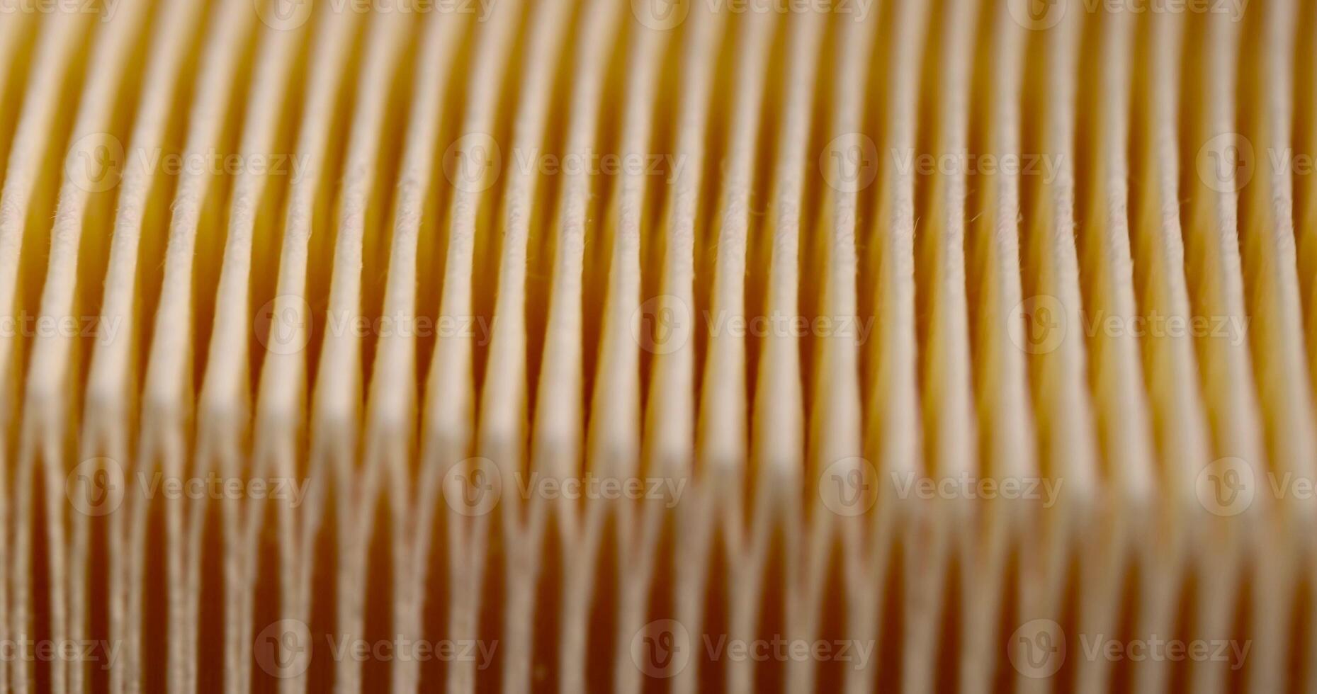 yellow paper filter for cleaning the air from dust and dirt in the car photo