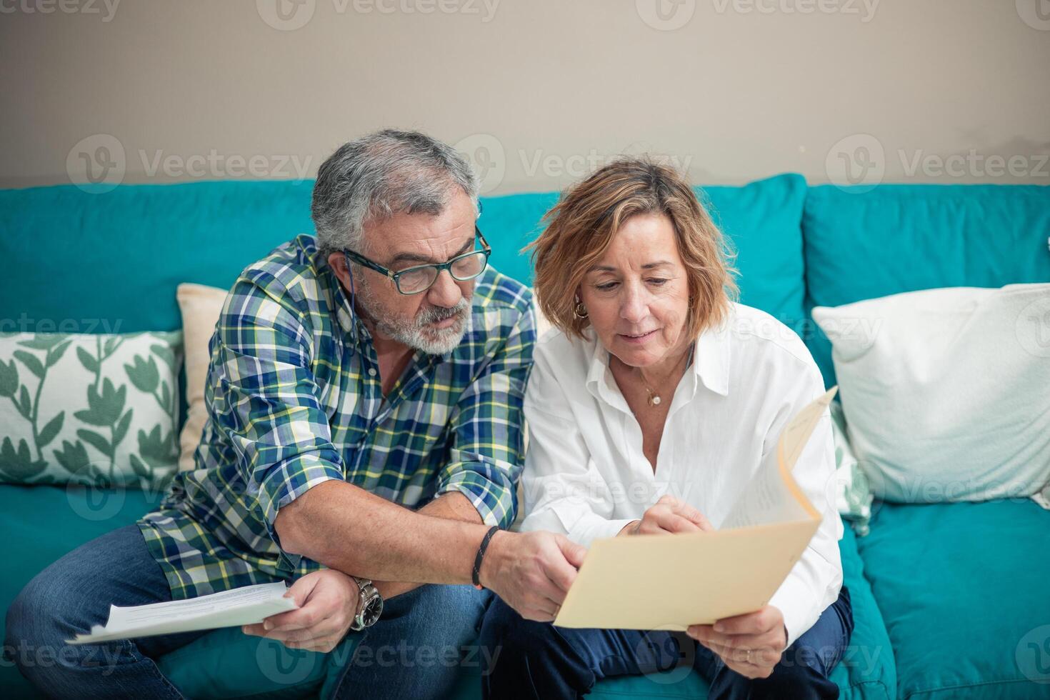 Retired Couple Managing Finances Together photo
