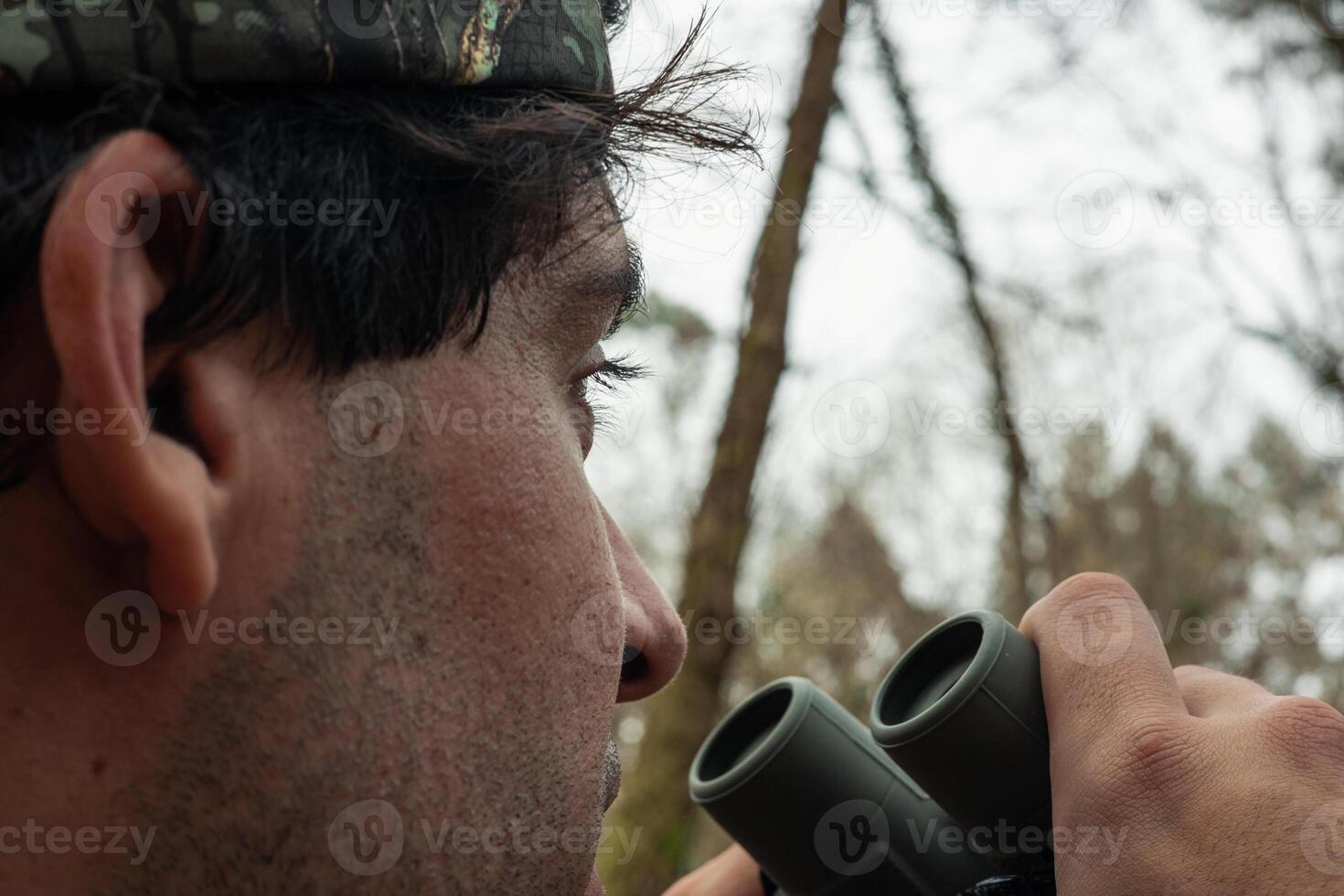 Forest Ranger on Watch Surveying the Wilderness photo