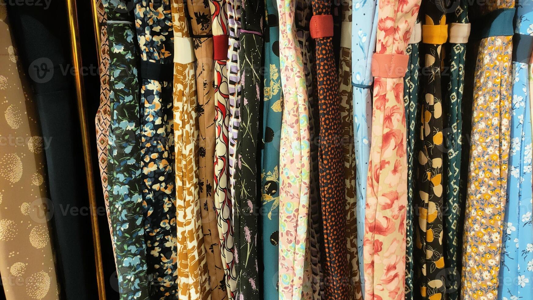 A row of ties with floral patterns photo