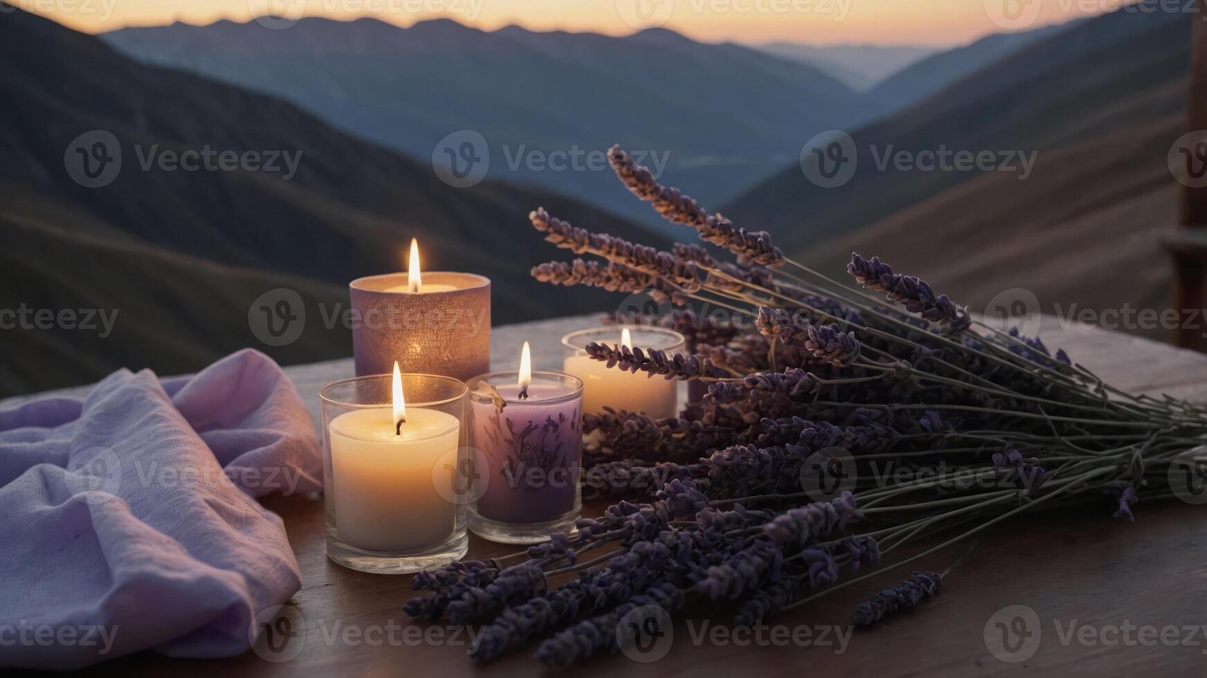 A serene arrangement of candles and lavender on a wooden table at sunset. photo