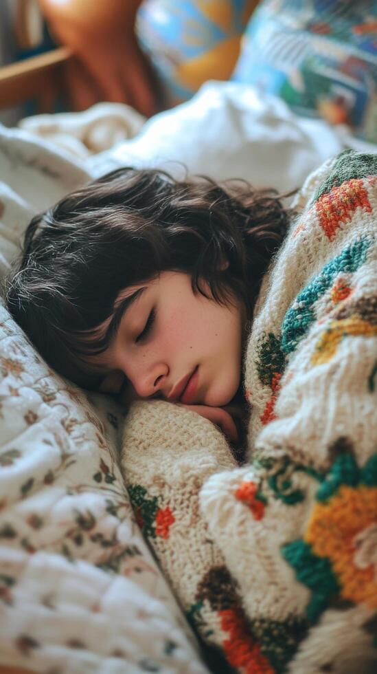 Young woman peacefully sleeping on a cozy bed with soft blankets and pillows photo