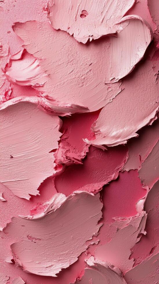 Beautiful shades of pink paint applied with texture on a canvas photo
