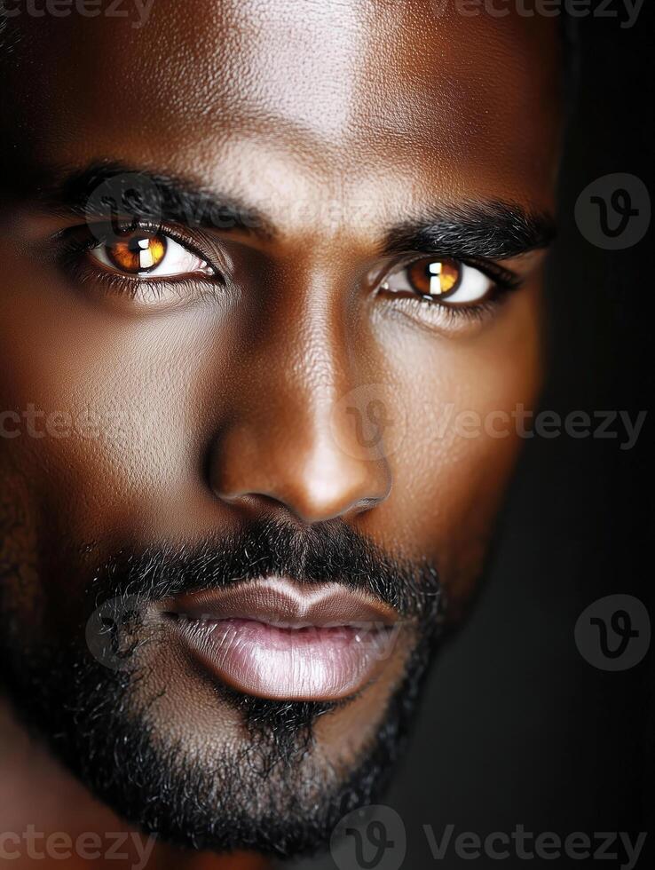 Captivating portrait of a Black individual in traditional attire with striking golden eyes photo