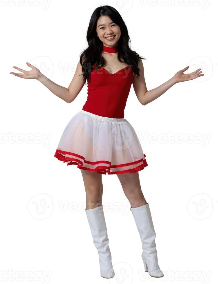 A smiling Asian woman in a red leotard and white tutu, wearing white boots, poses against a plain background. photo