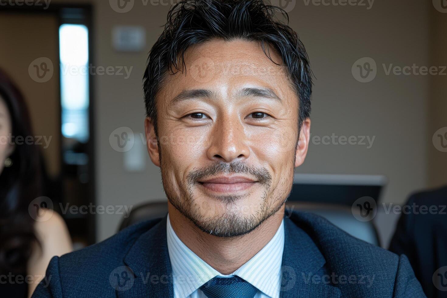 Portrait of a smiling businessman in a suit photo