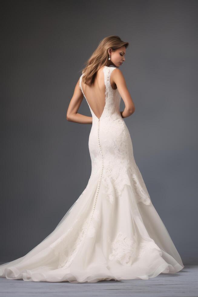 Elegant bridal gown with open back photo