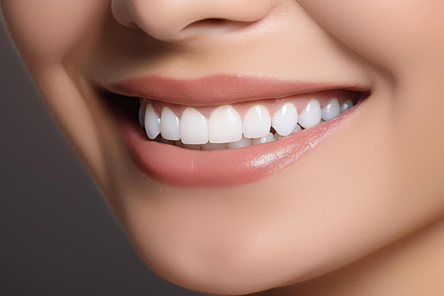 close up of a womans smiling lips and teeth photo