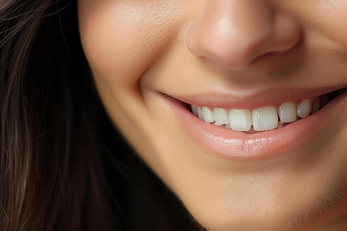 Close up of a smiling womans face photo