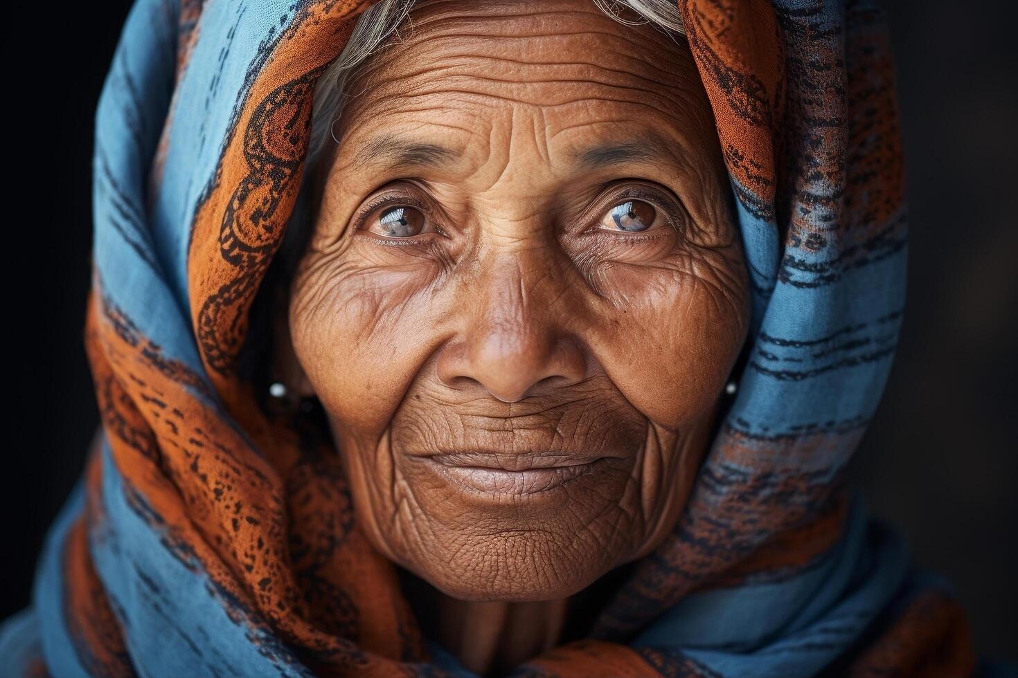 Weathered face of an elderly woman photo