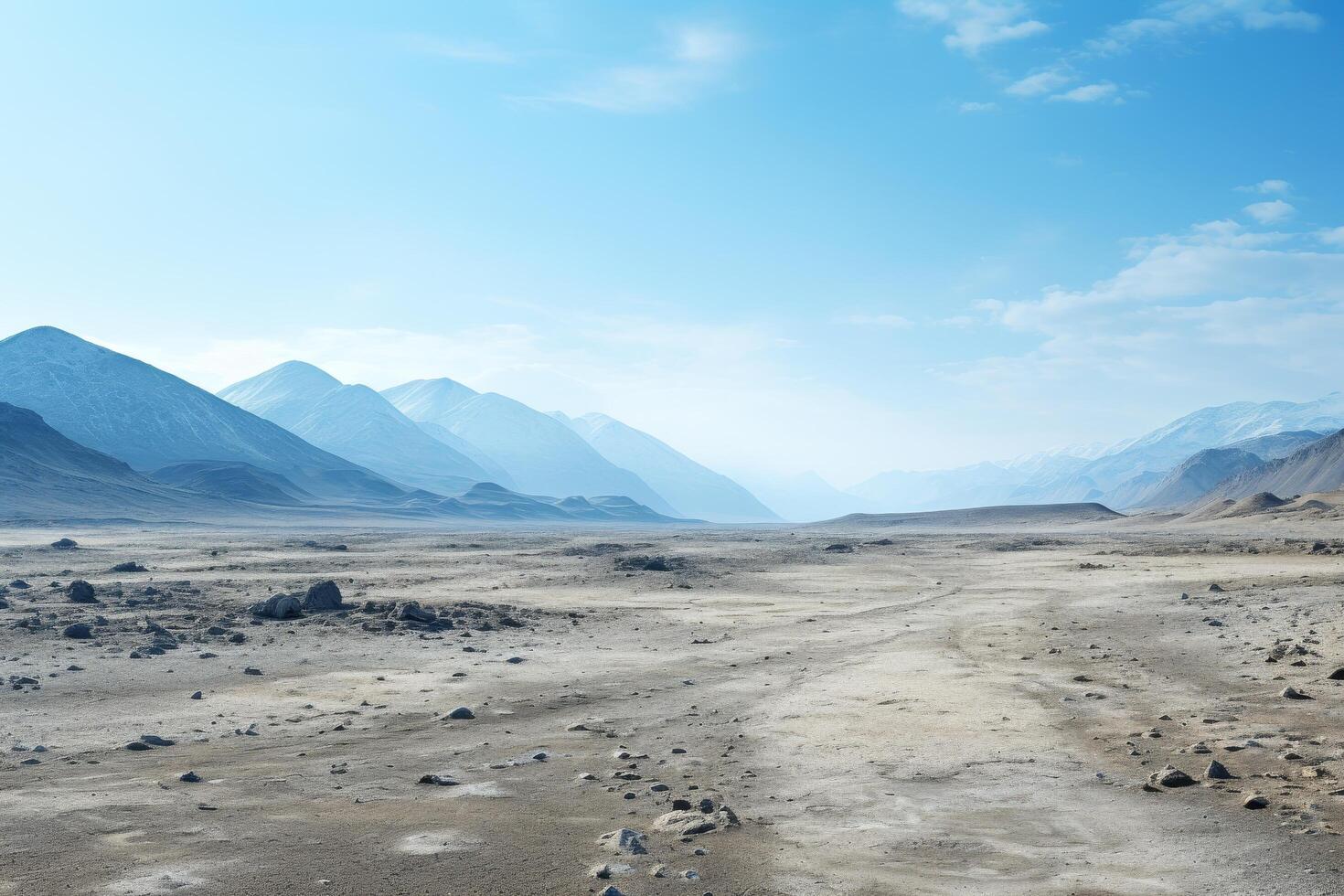 Vast desert landscape with mountains in the distance photo