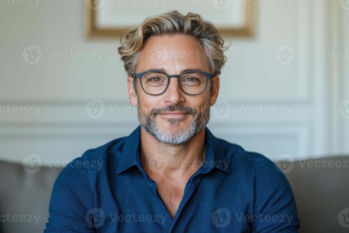 Portrait of a smiling man with glasses photo
