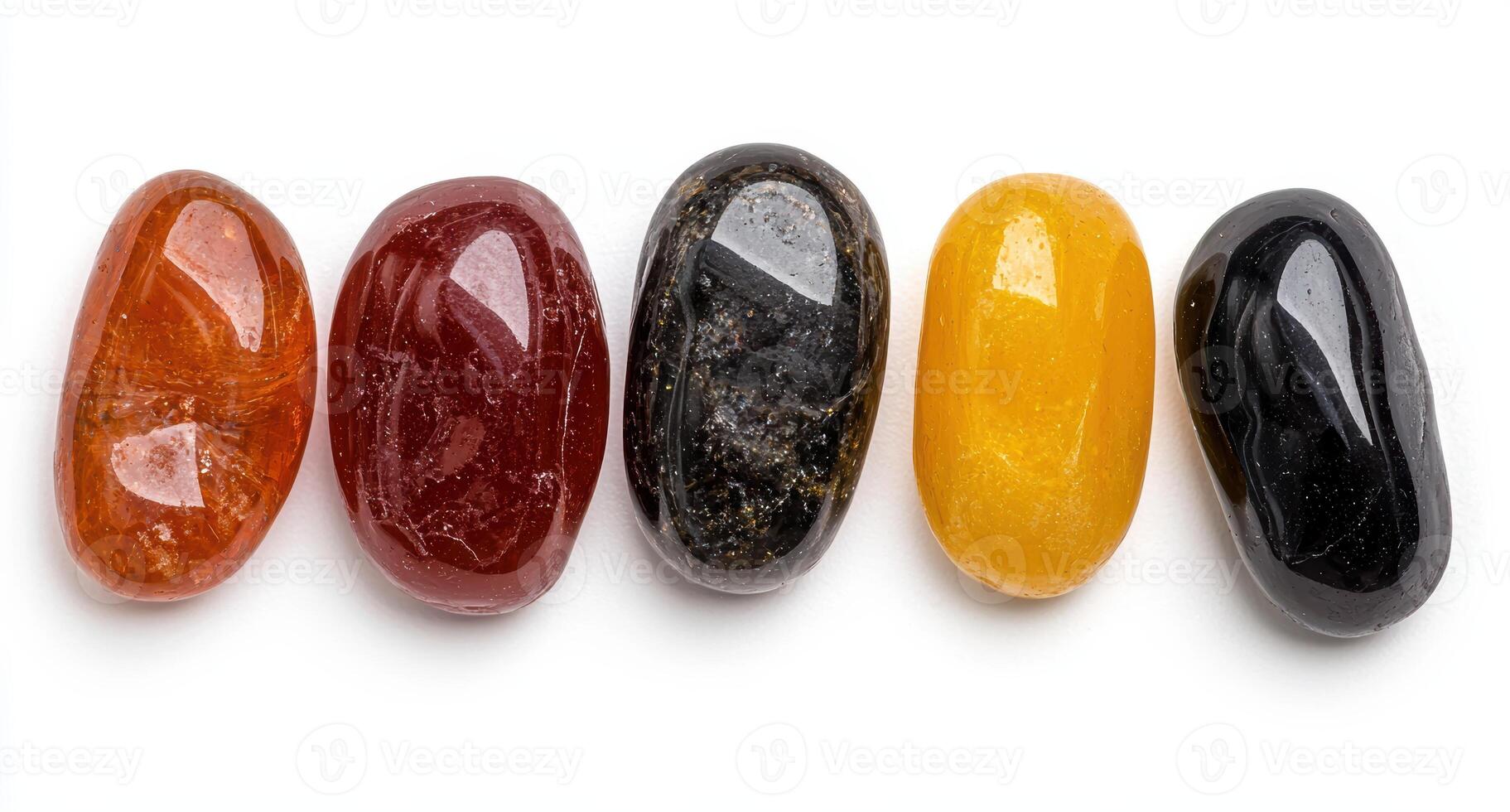 Five tumbled gemstones in a row on white background photo
