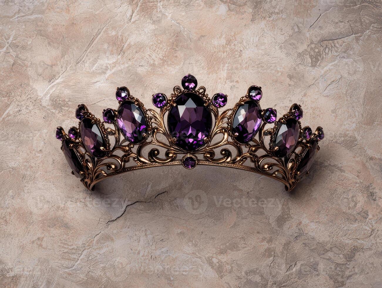 Elegant purple tiara with gemstones on marble background photo