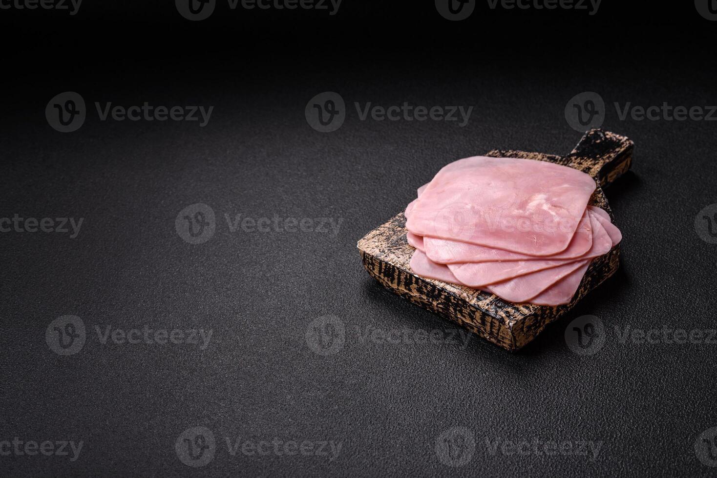 Ham cut into square slices for making delicious nutritious sandwiches photo