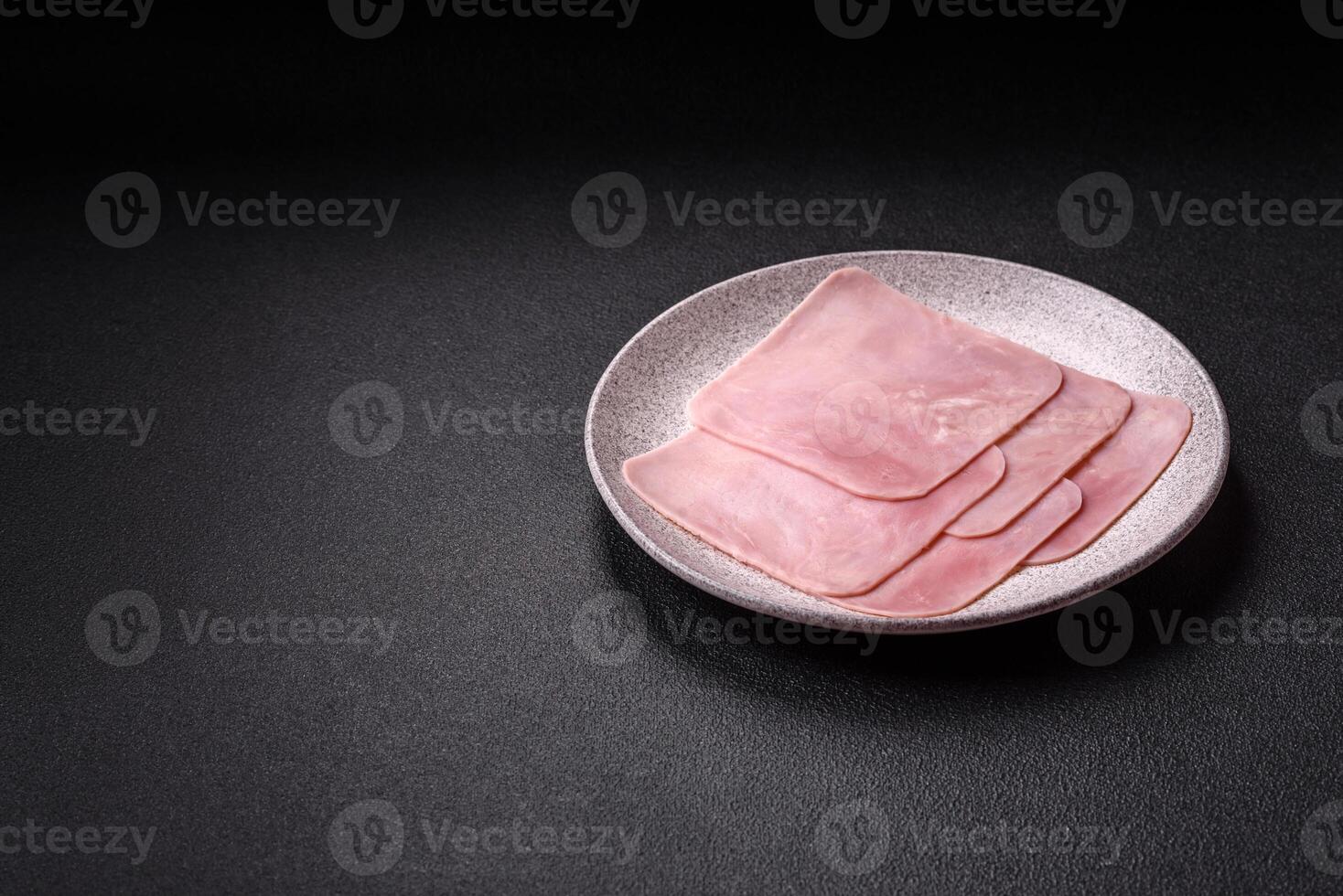 Ham cut into square slices for making delicious nutritious sandwiches photo
