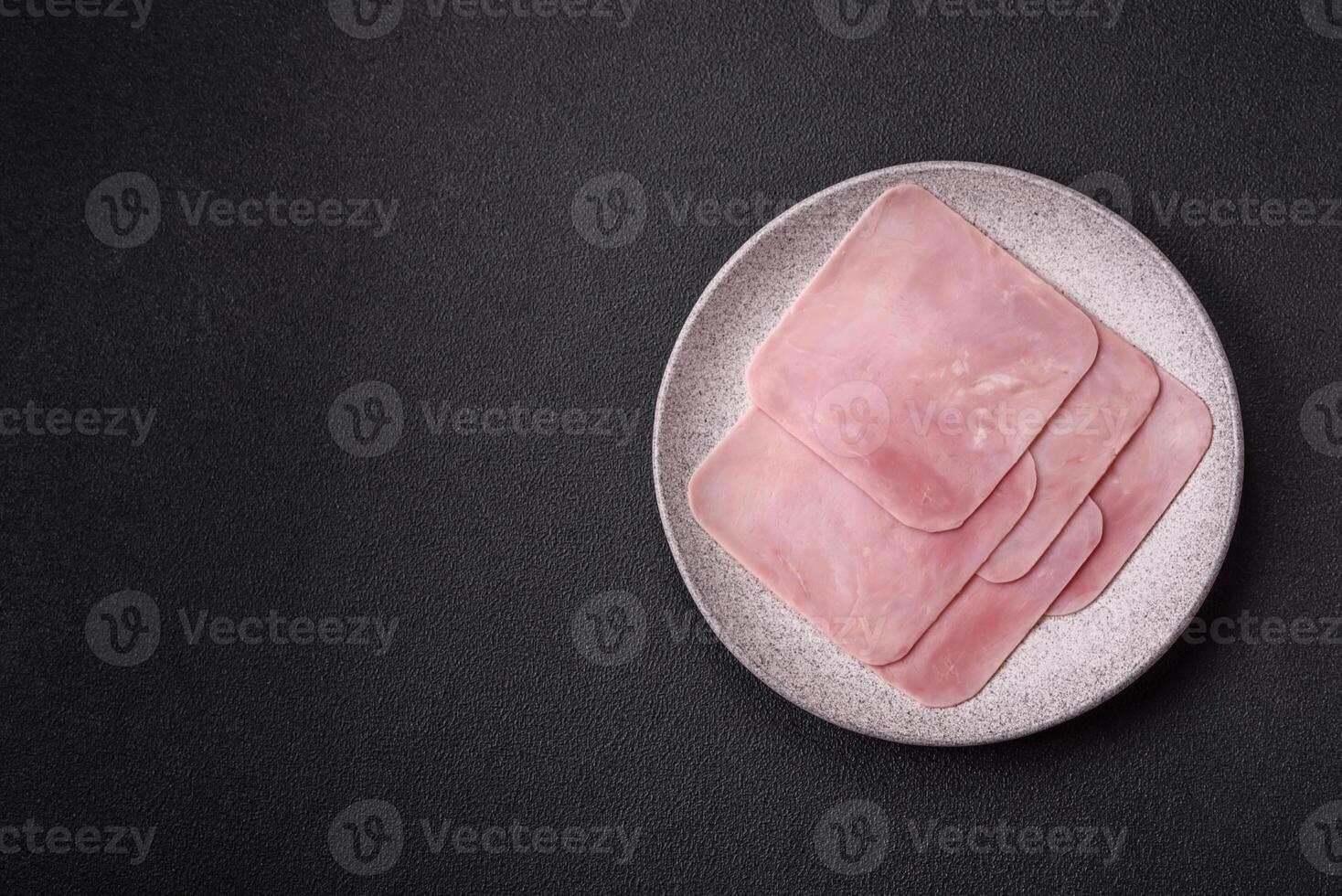 Ham cut into square slices for making delicious nutritious sandwiches photo