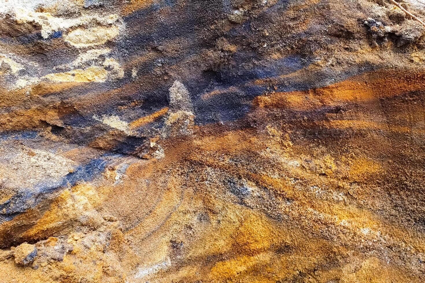 slopes are a quarry with a rock containing gold. Searching for gold. photo