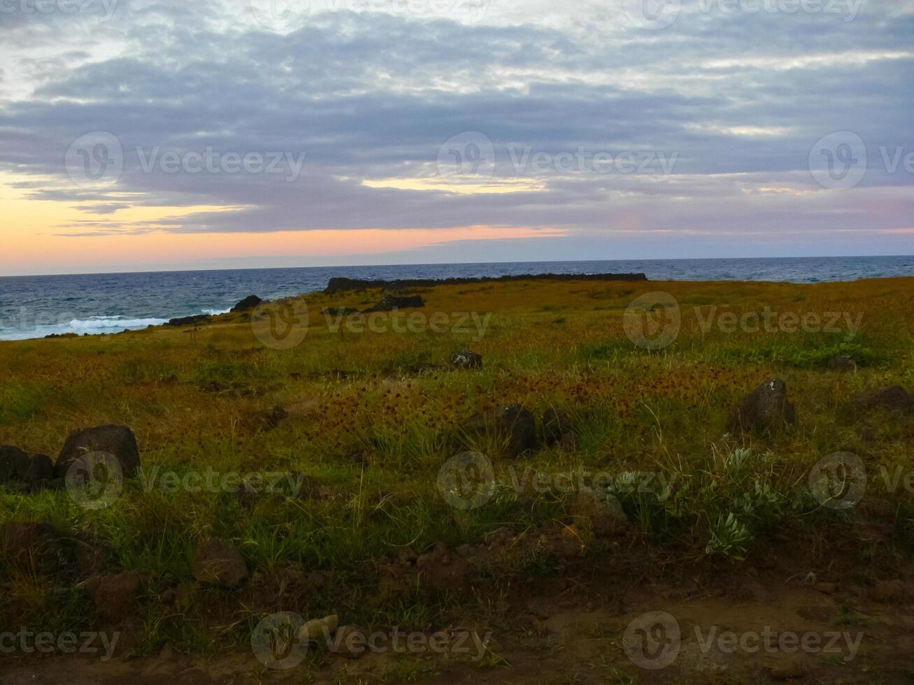 Sunset on Easter Island. The colors of sunset in ocean. photo