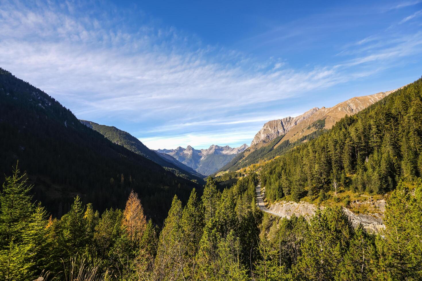 Blue sky with a few clouds in the Austrian Alps, Tyrol photo