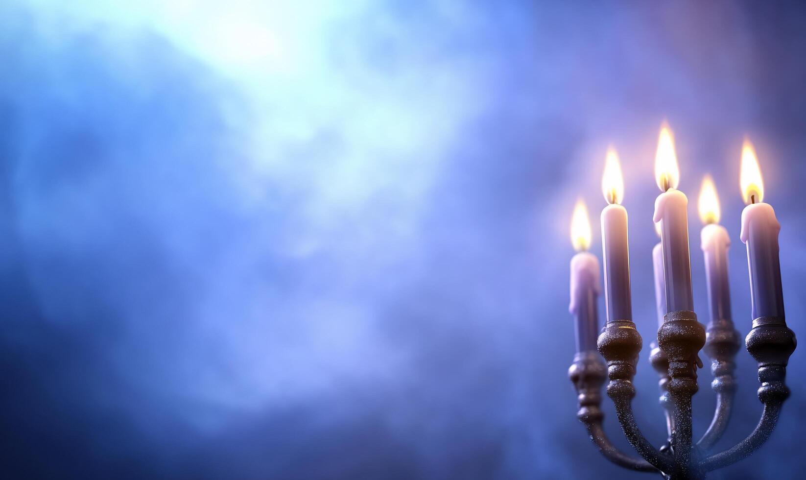 A menorah with four lit candles on a dark background photo