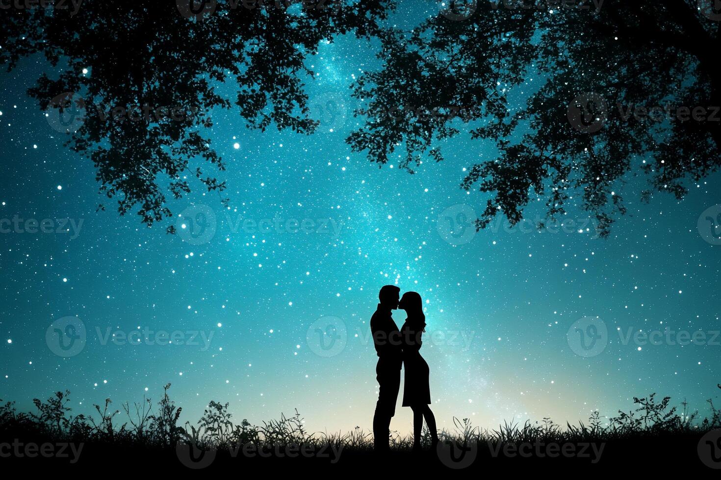 A romantic silhouette of a couple under a starry night sky. photo