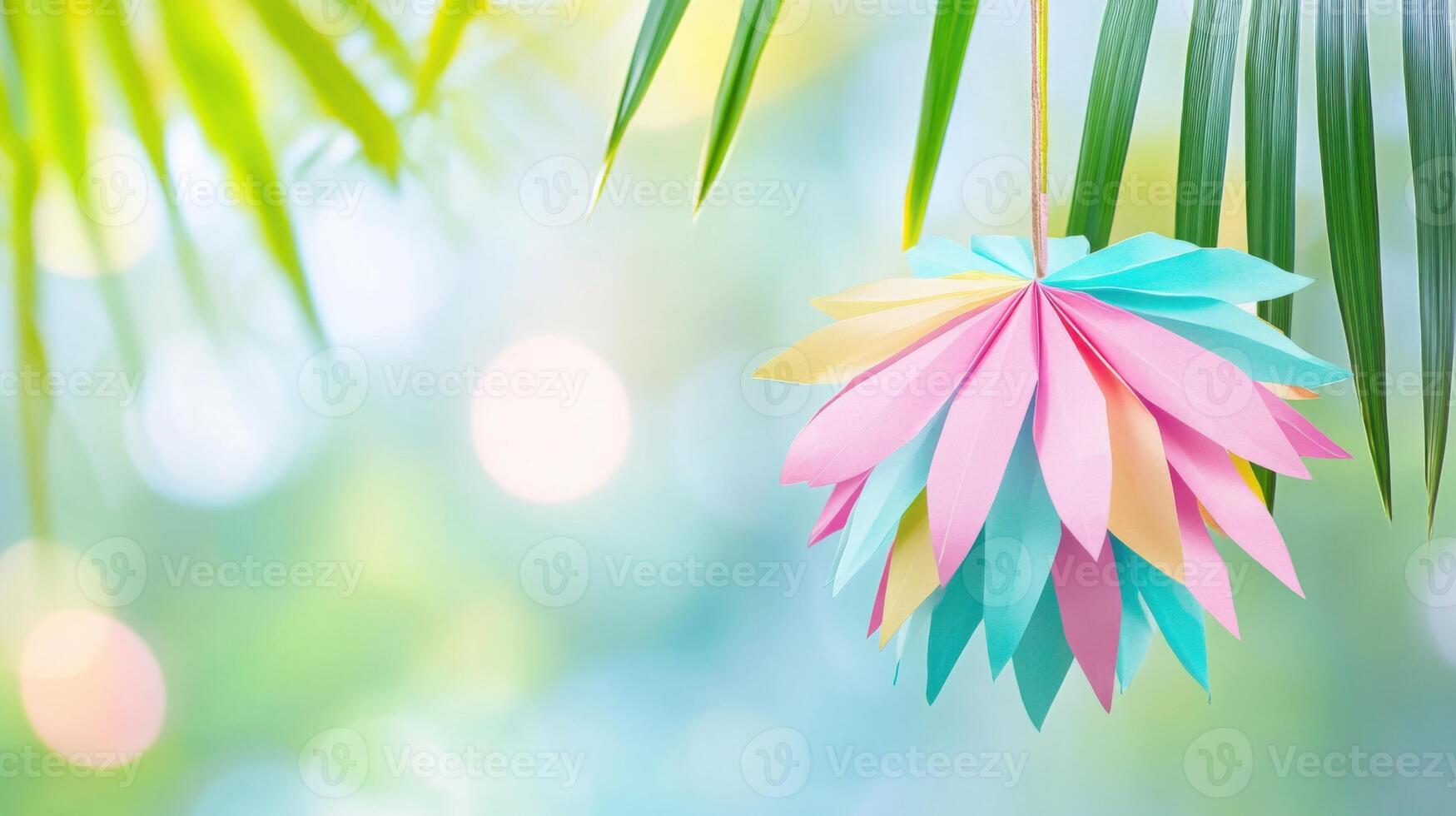 Festive pastel pinata in pink and mint colors brightening up a sunny garden party setting photo
