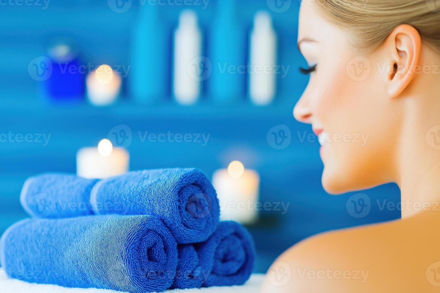 Luxurious spa interior designed for relaxation featuring plush towels and tranquil aqua accents photo